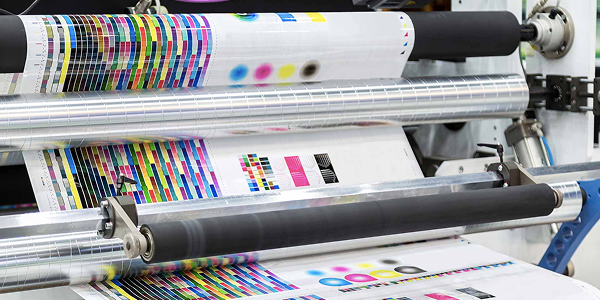 Stacks of printed books in a press room